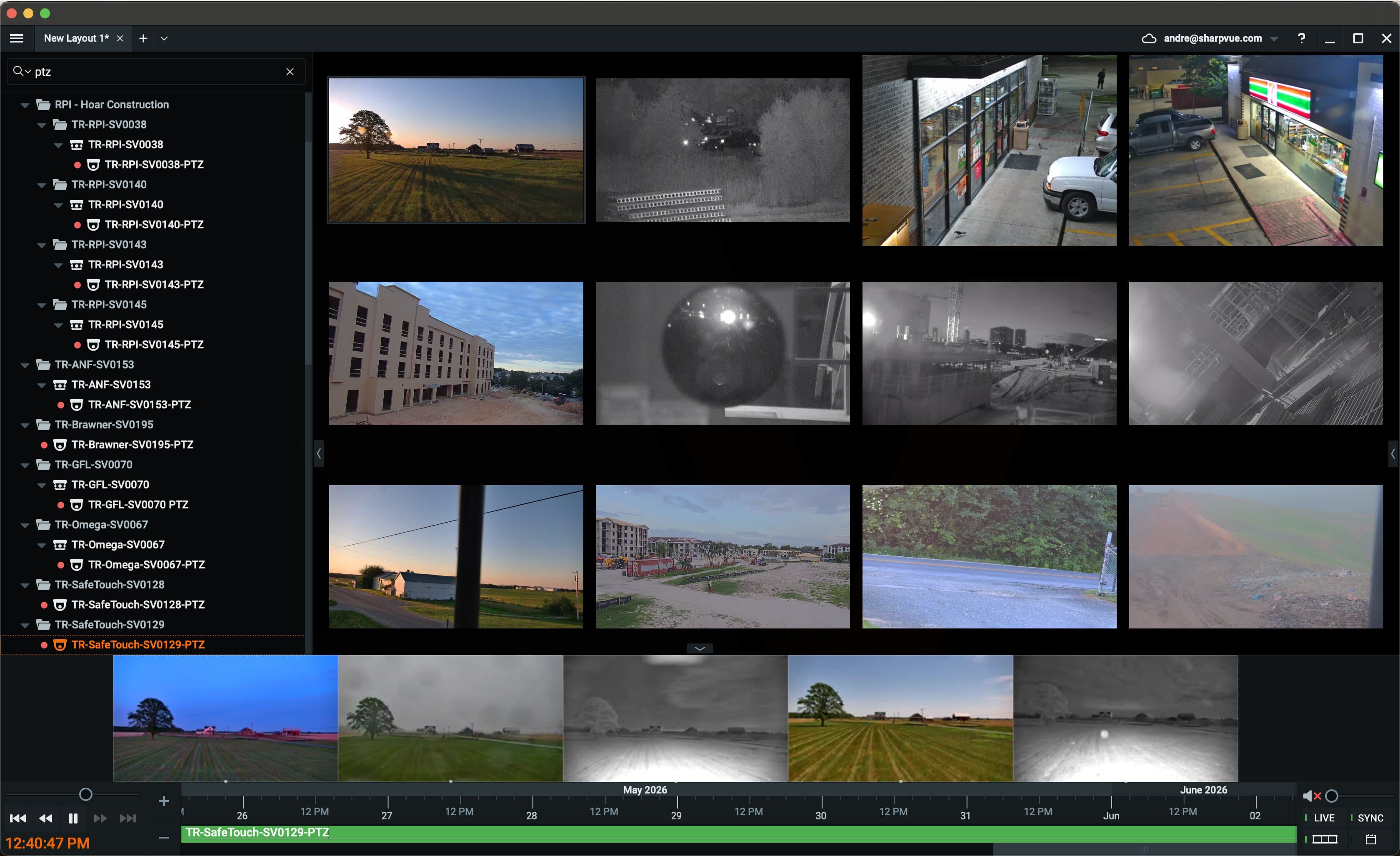 iVision desktop client showing a multi-camera live wall with a continuous recording timeline scrubbing back across two days